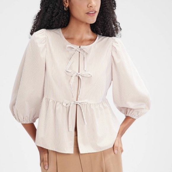 XXL Puff 3/4 Sleeve Tie-Front
Blouse - A New Day Striped - Picture 8 of 14